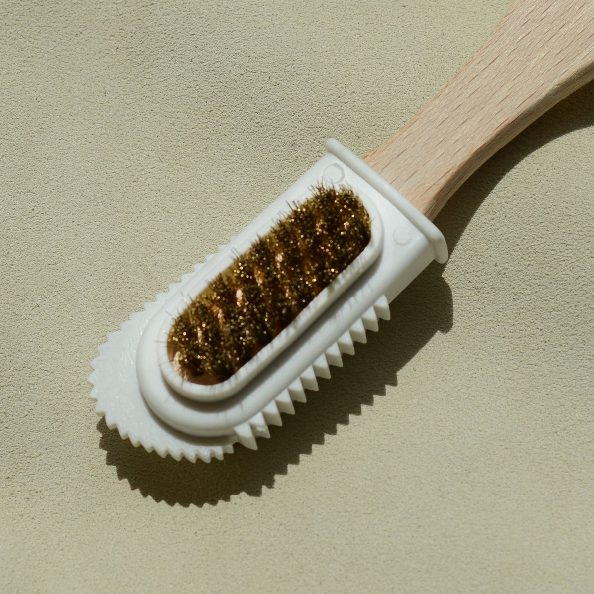 Brush for suede leathers