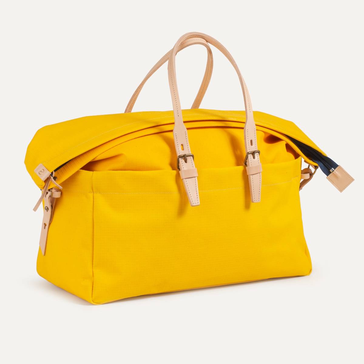 Un voyage bag yellow hotsell