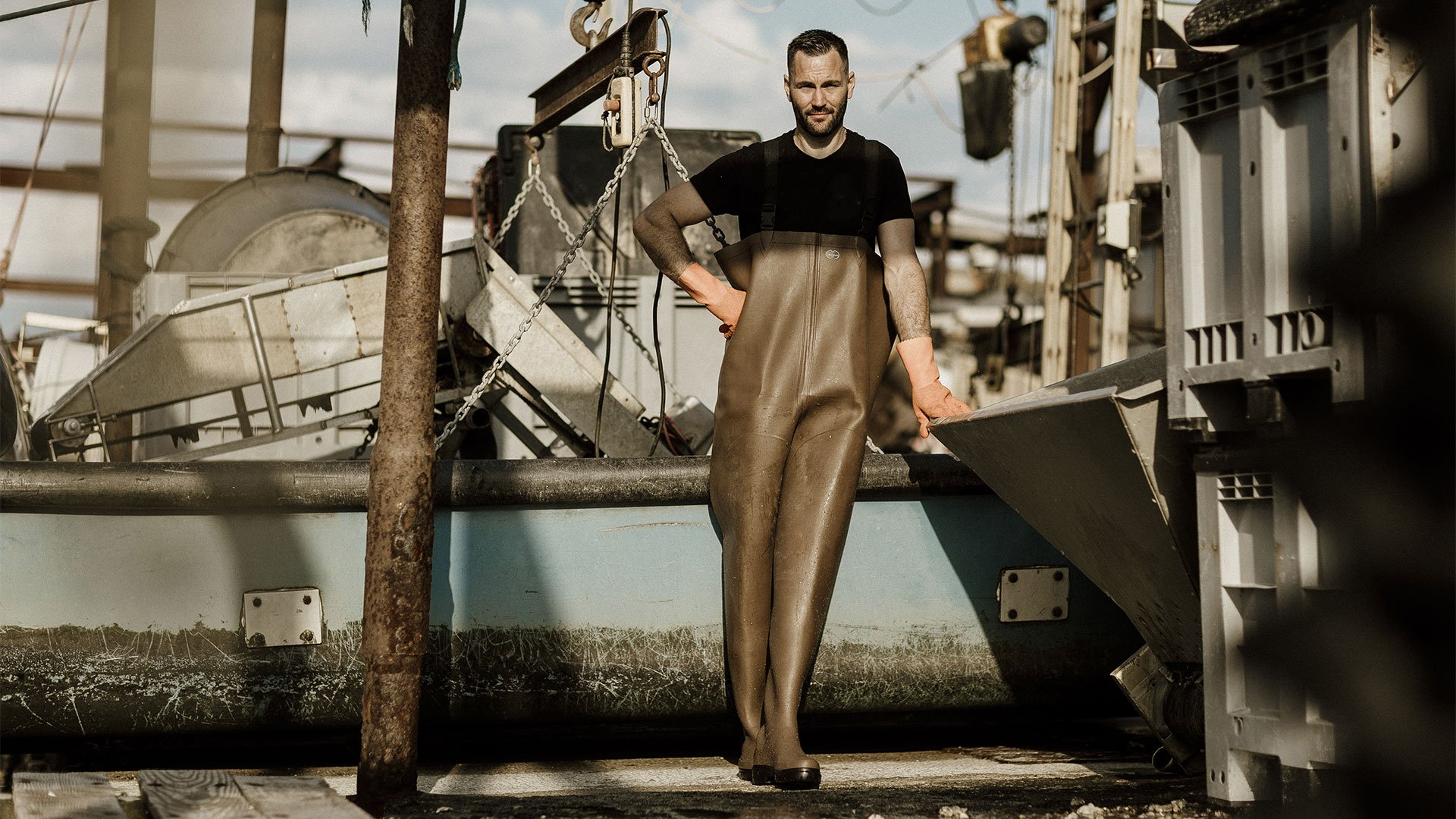 An ostreiculturist wears waders