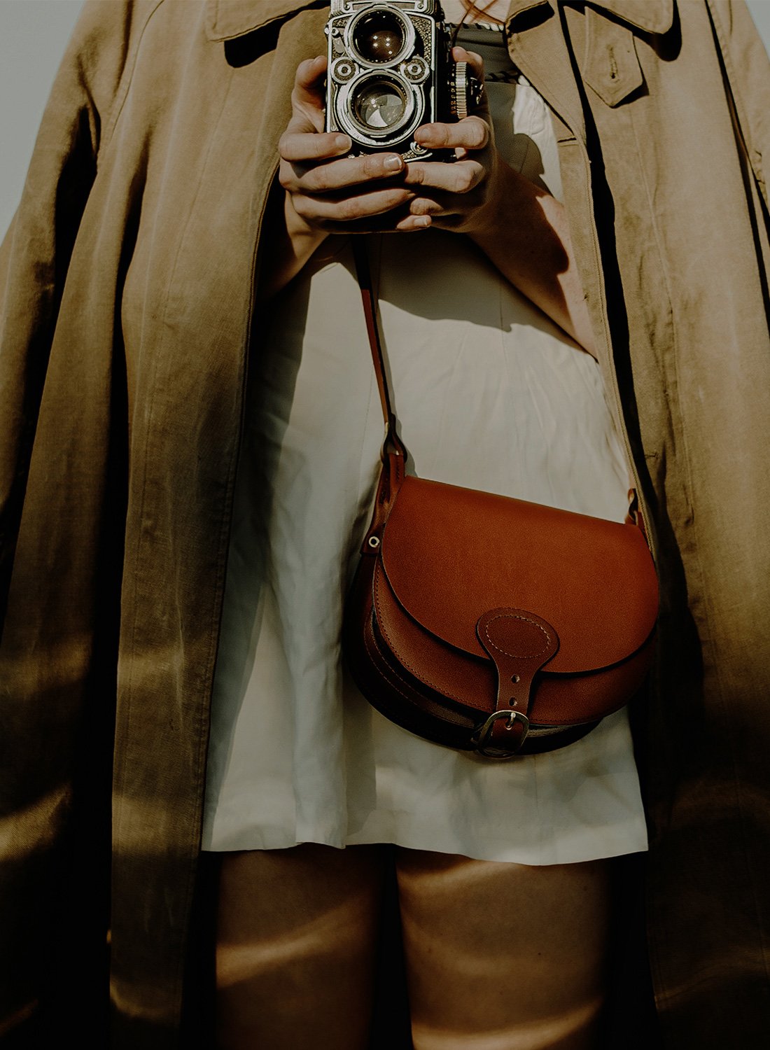 The Diane leather bag worn by a woman