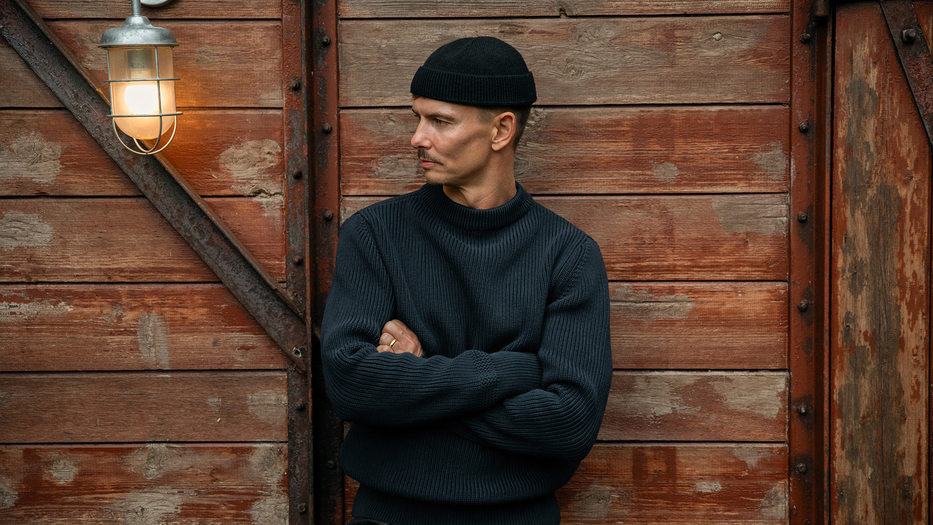 A man wears the Cancale sailor sweater