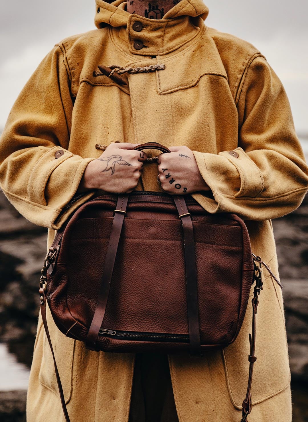 Sac en cuir, protection de la pluie