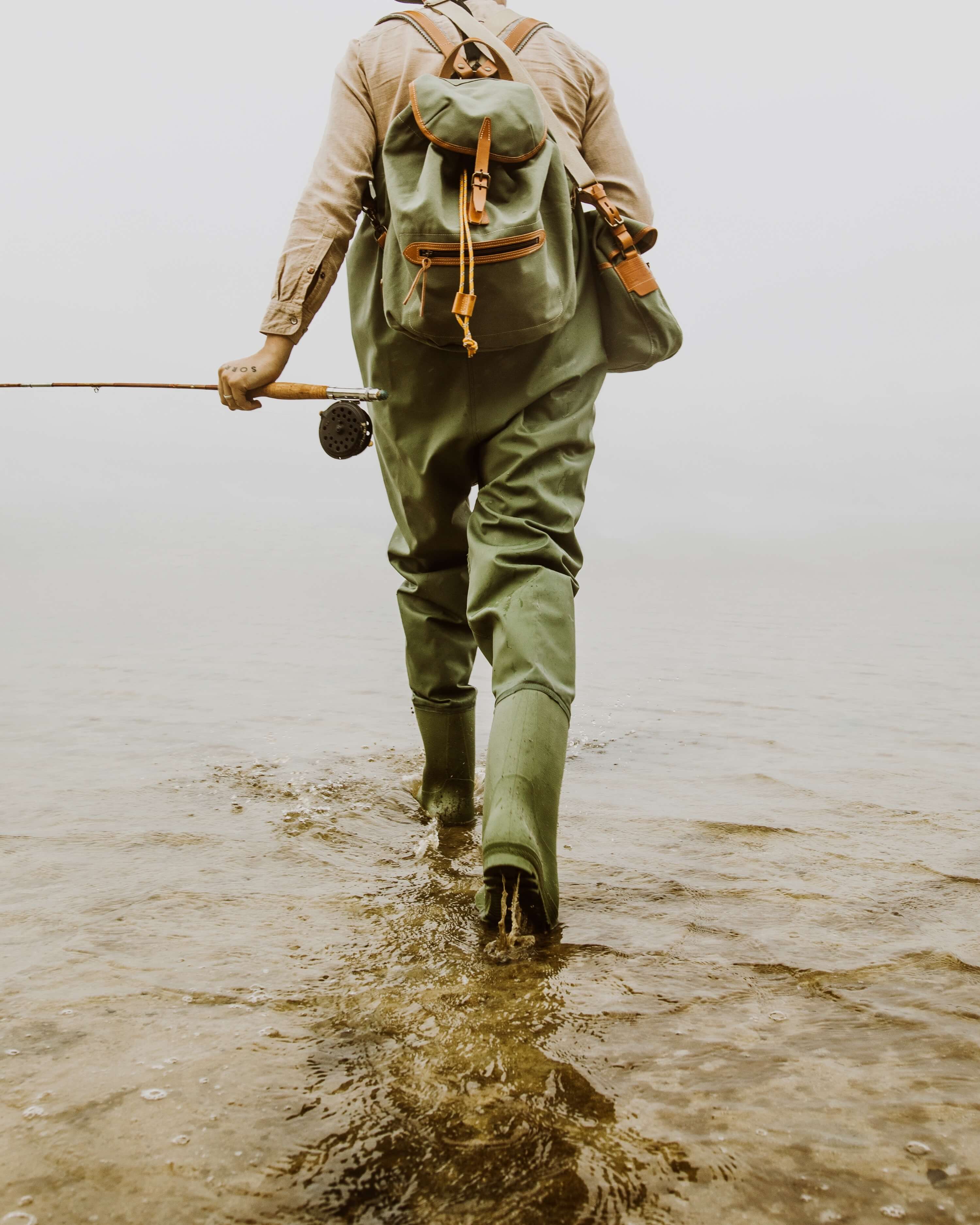 A fisherman's carry a musette bag and a canvas backpack