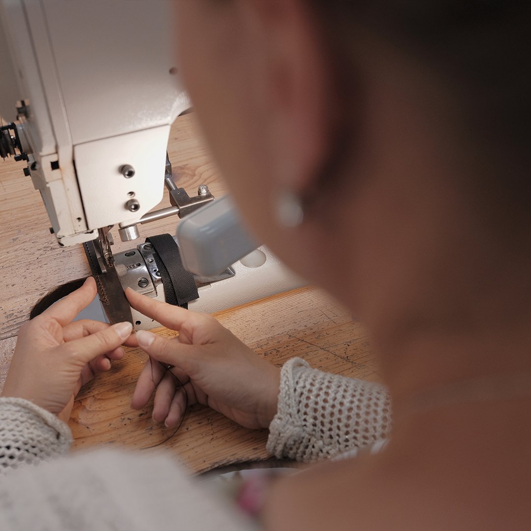 Leather craftsman sewing